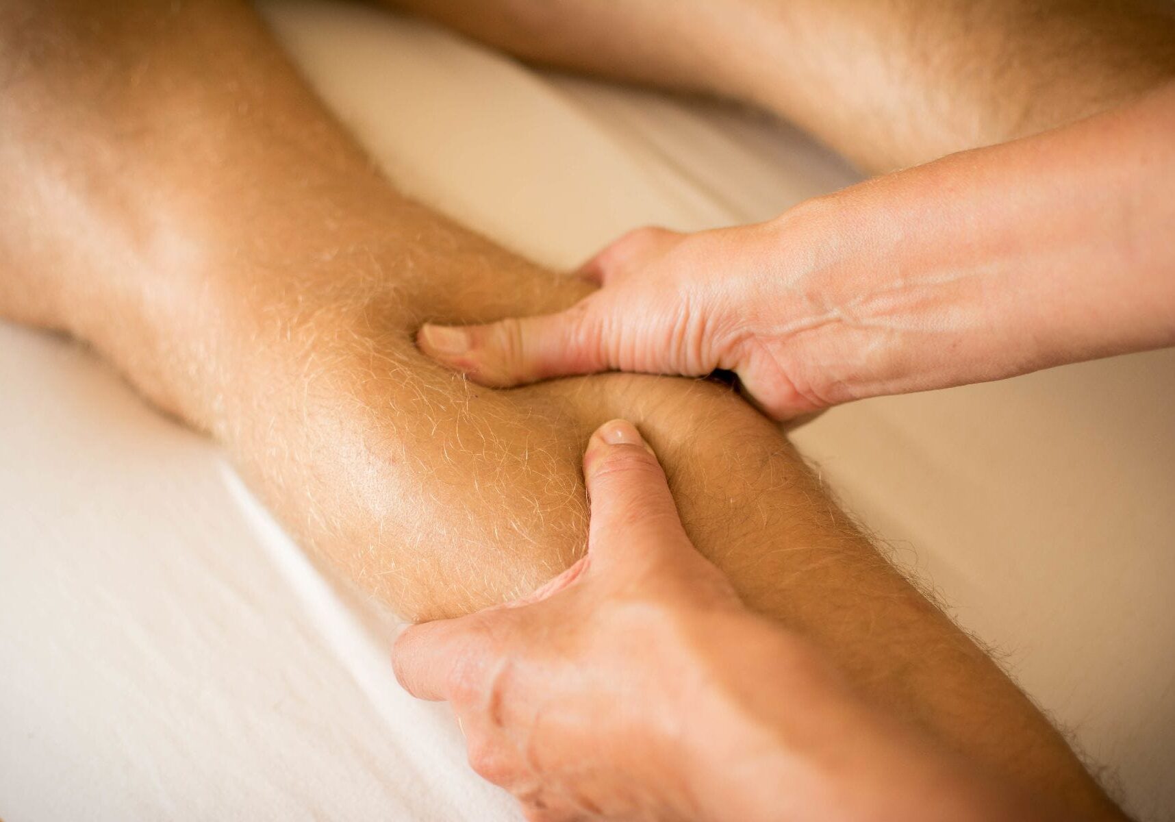 Sports massage to the left calf